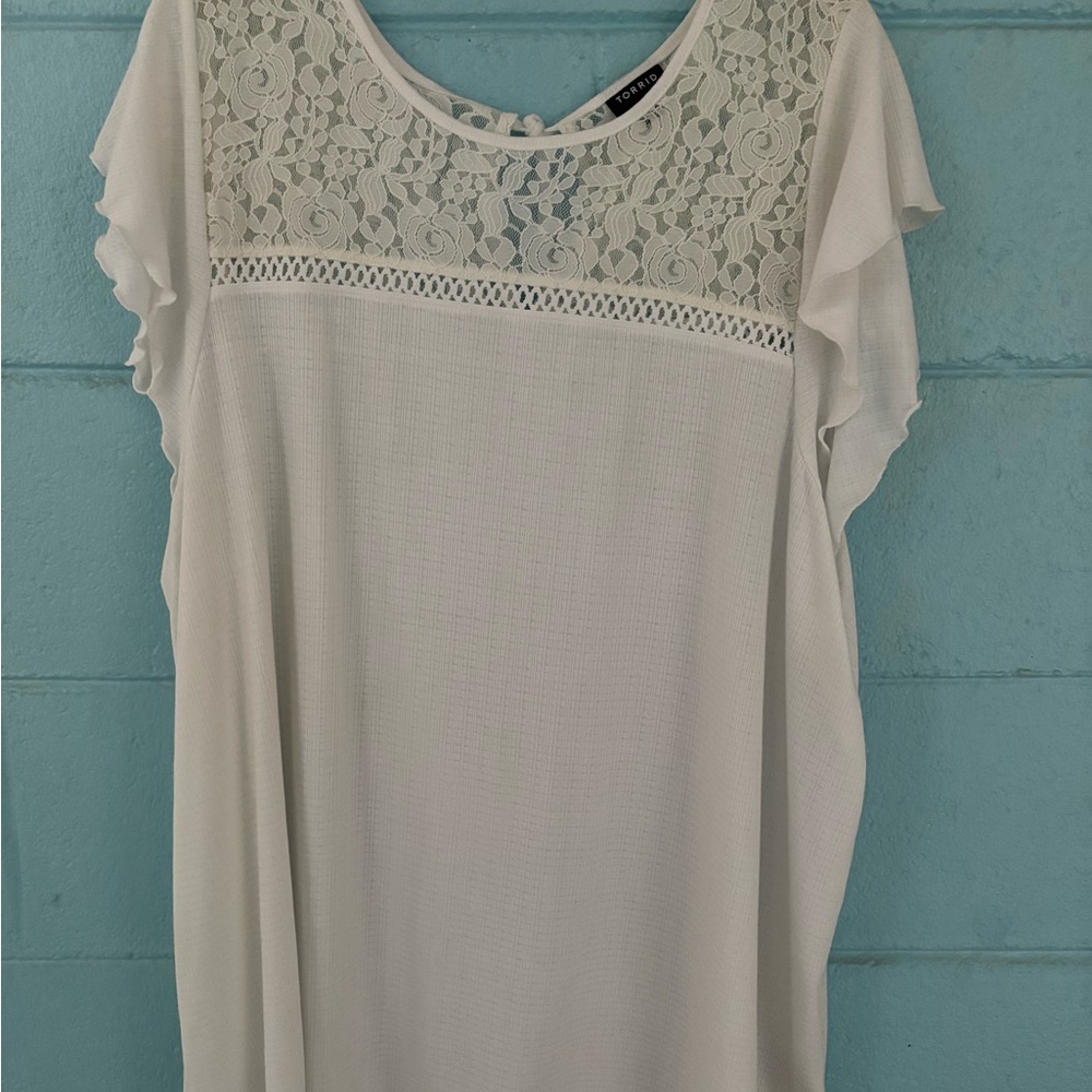 Torrid White Blouse with Elegant Design